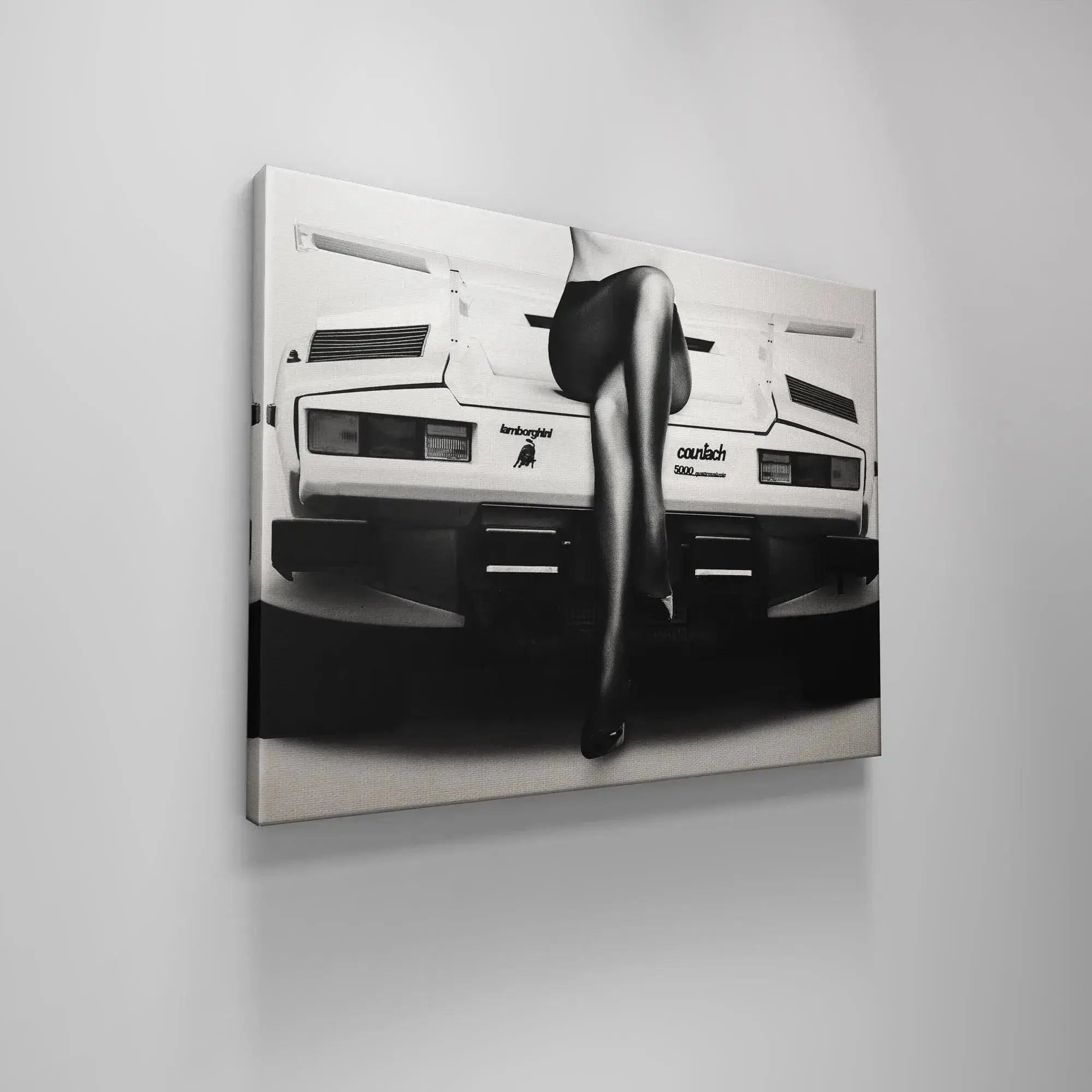 High contrast photographic print highlighting the signature Lamborghini badge on the white Back End.