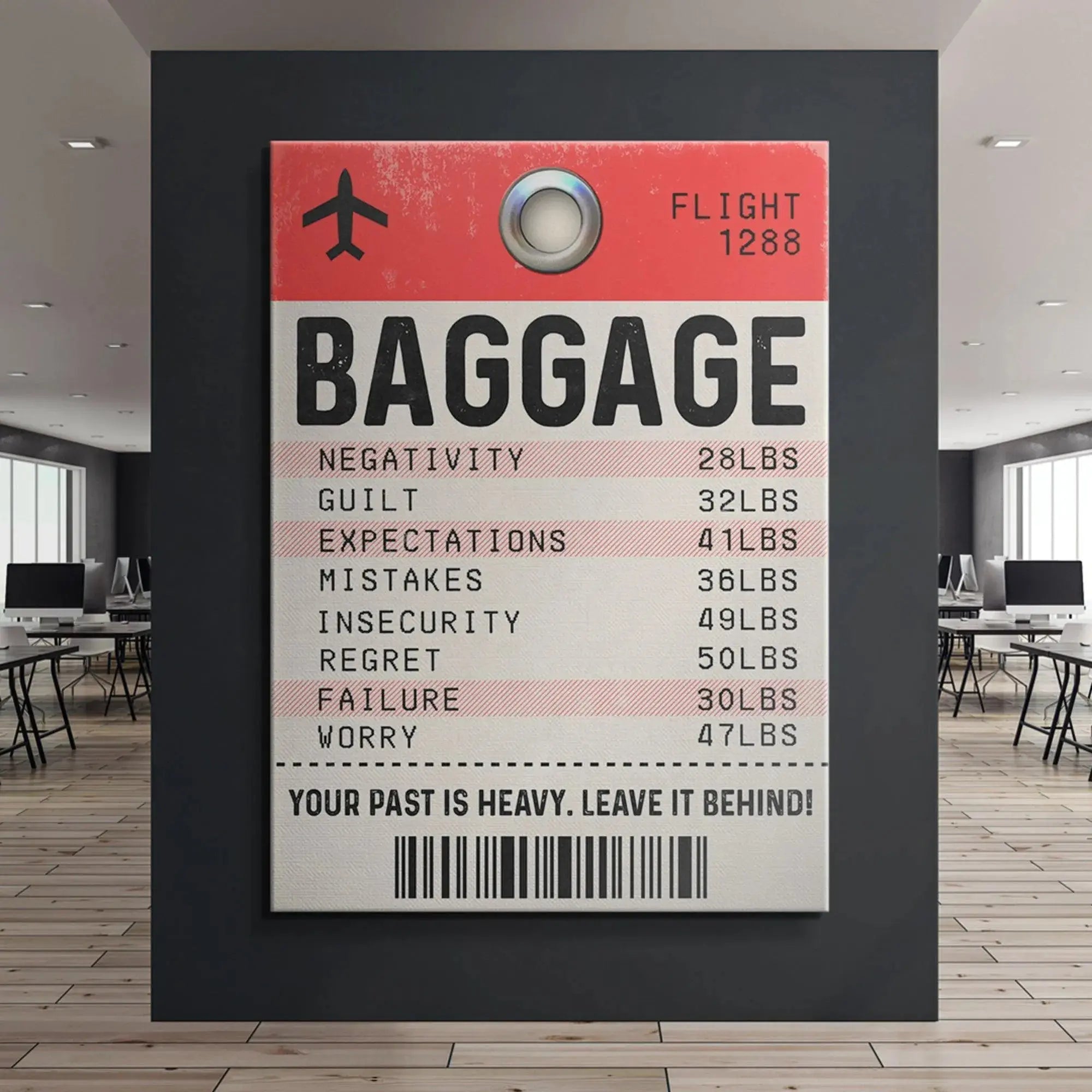 Corner angle view of the rectangular 'Your Past Is Heavy' phrase above the barcode on the symbolic Baggage Tag.