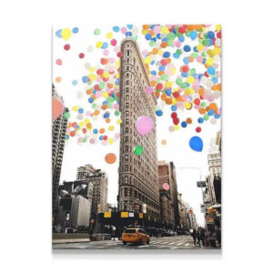 Flatiron Building perspective under a massive cluster of colorful party balloons | Balloon City.