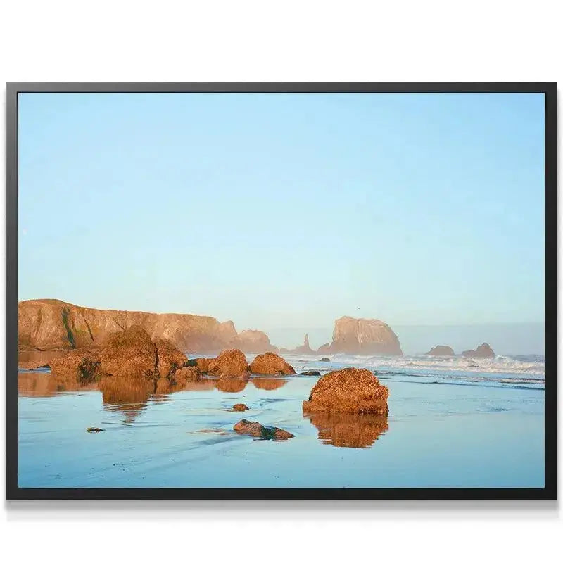 Close-up view of the rugged brown texture of the foreground rock in the 'Bandon Blues' photo.
