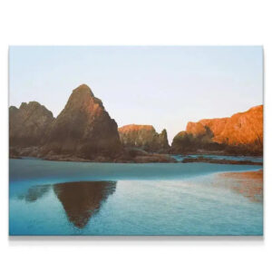 Panoramic view of sea stacks reflecting in water, titled Bandon N2