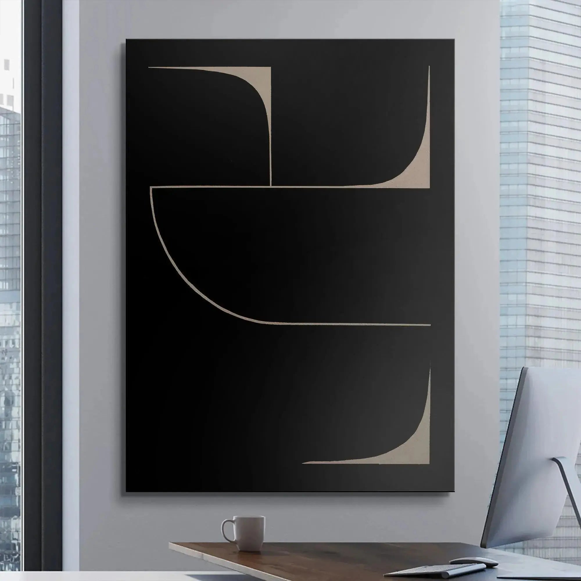 Wide shot of the Black Eidos art hanging in a bright, modern office space.