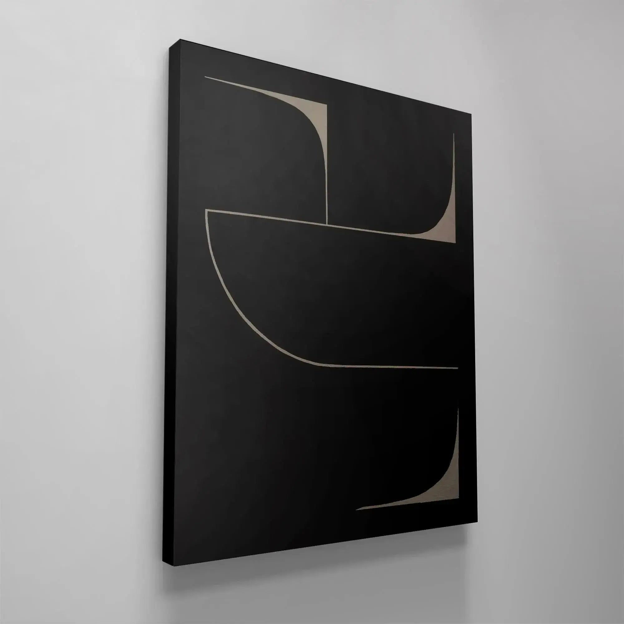 The curvature of the bottom-left corner defining the shape in the Black Eidos artwork.