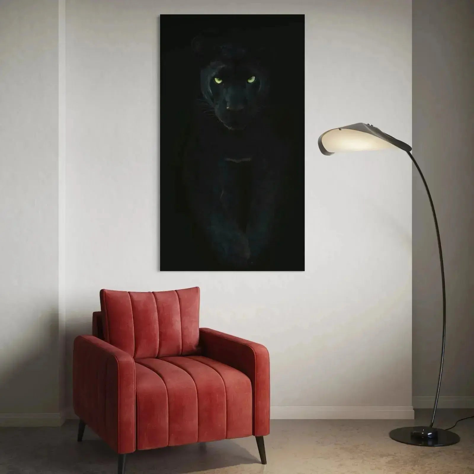 Lifestyle image of the Black panther wall art hung above a gray minimalist sofa in a modern living room setting.