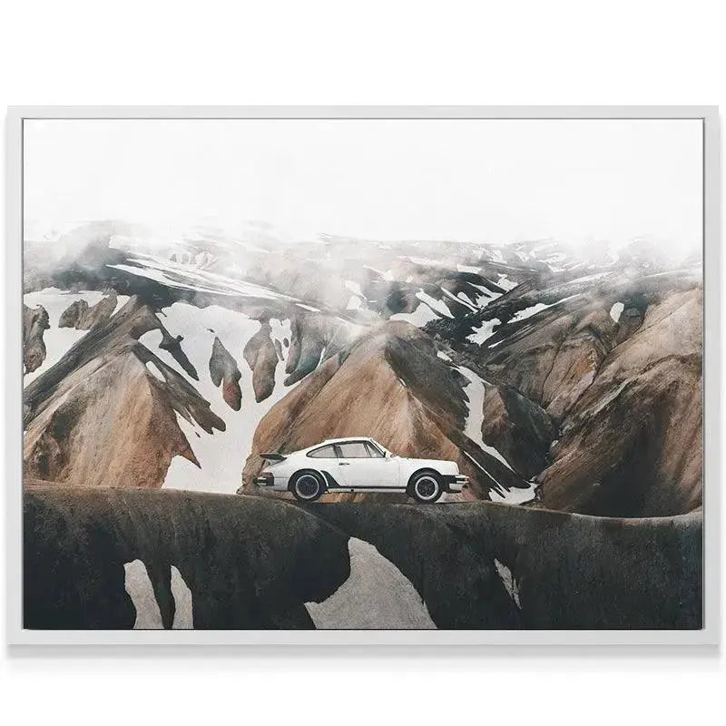 Side profile view of the vintage white sports car resting on the ridge in the dramatic 'Blend In' photograph.