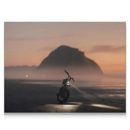 Close-up of the motorcycle headlight beam piercing the mist on the beach, titled Blue Hour Morro.