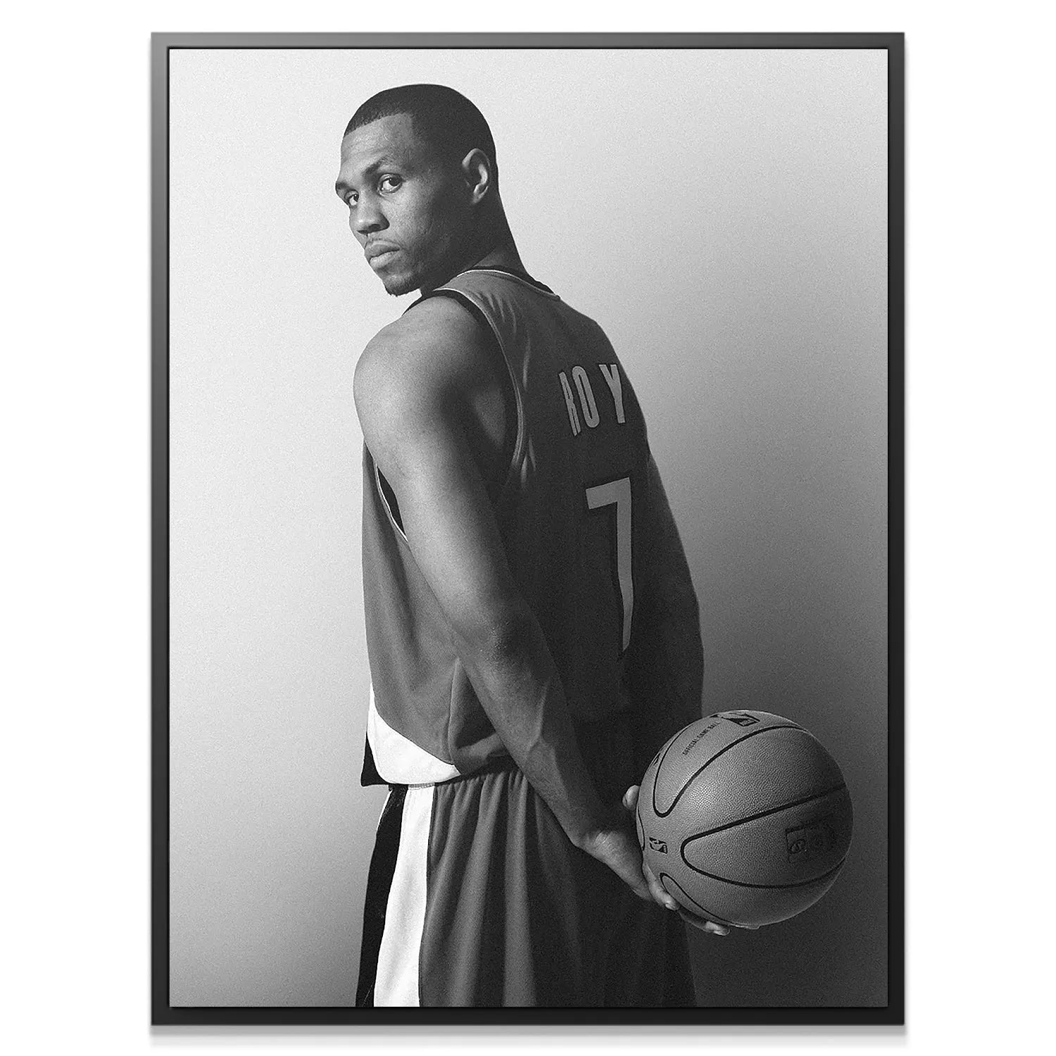 Dramatic black and white photograph focusing on the intense, over-the-shoulder expression of Brandon Roy - Back.