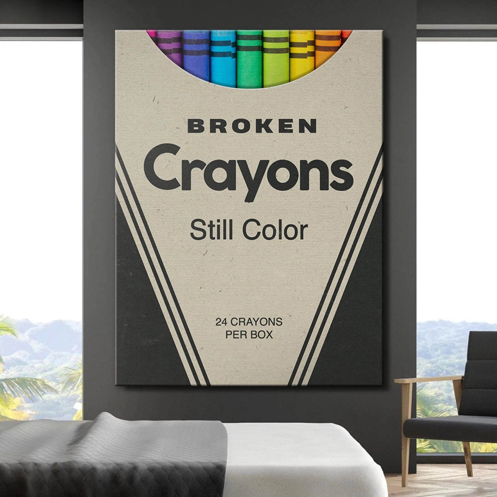 Detail of the bold black typography reading 'BROKEN Crayons Still Color' on the front panel.