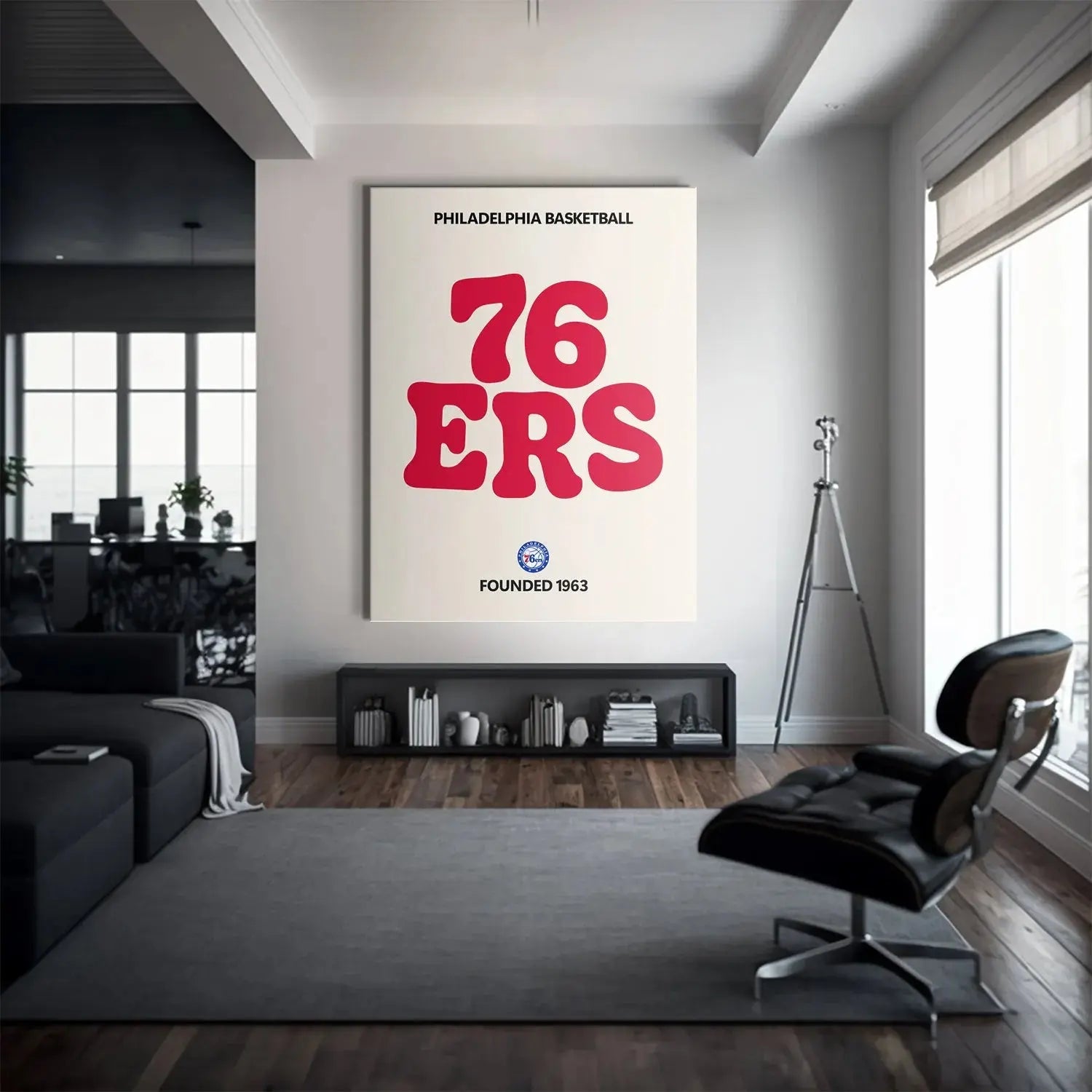 Lifestyle mock-up of the framed 'Broken Text - 76ers' art displayed above a modern couch in a living room setting.