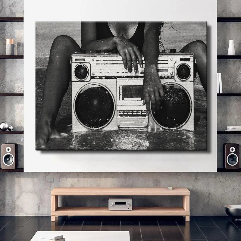 Black and white lifestyle image featuring the iconic retro design of the Brooklyn Boombox on the beach.