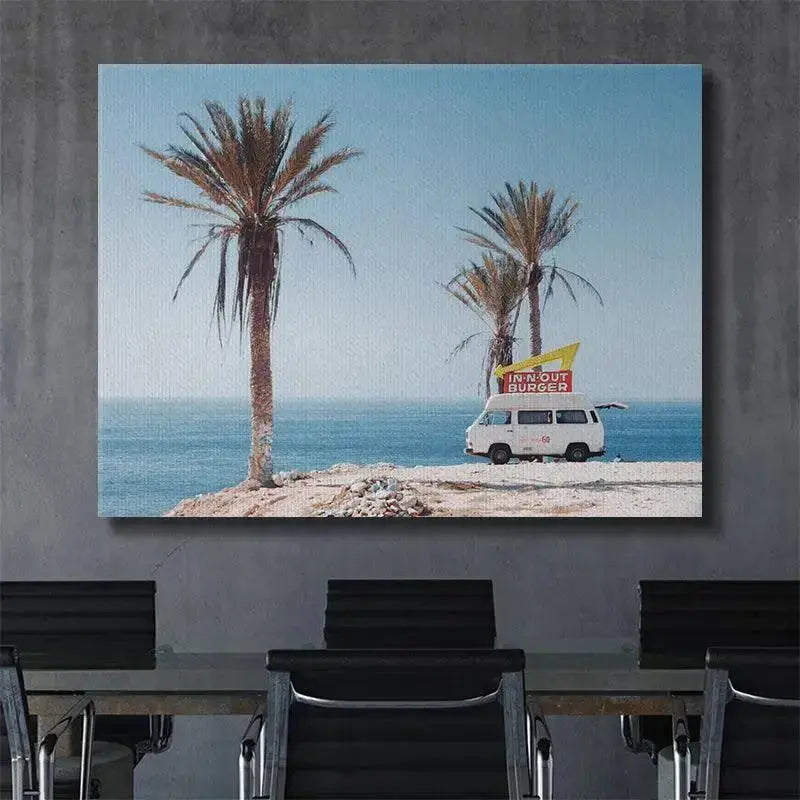 High-angle perspective of the distant blue waves behind the classic food service Burger Truck vehicle.