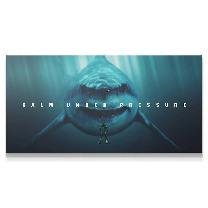 Full shot of the diver facing the great white shark deep underwater, titled "Calm Under Pressure".