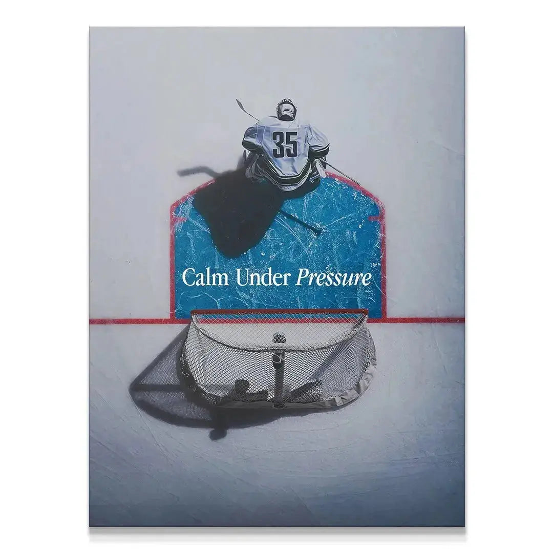 Overhead view of Goalie 35 guarding the net, titled Calm Under Pressure (Hockey).