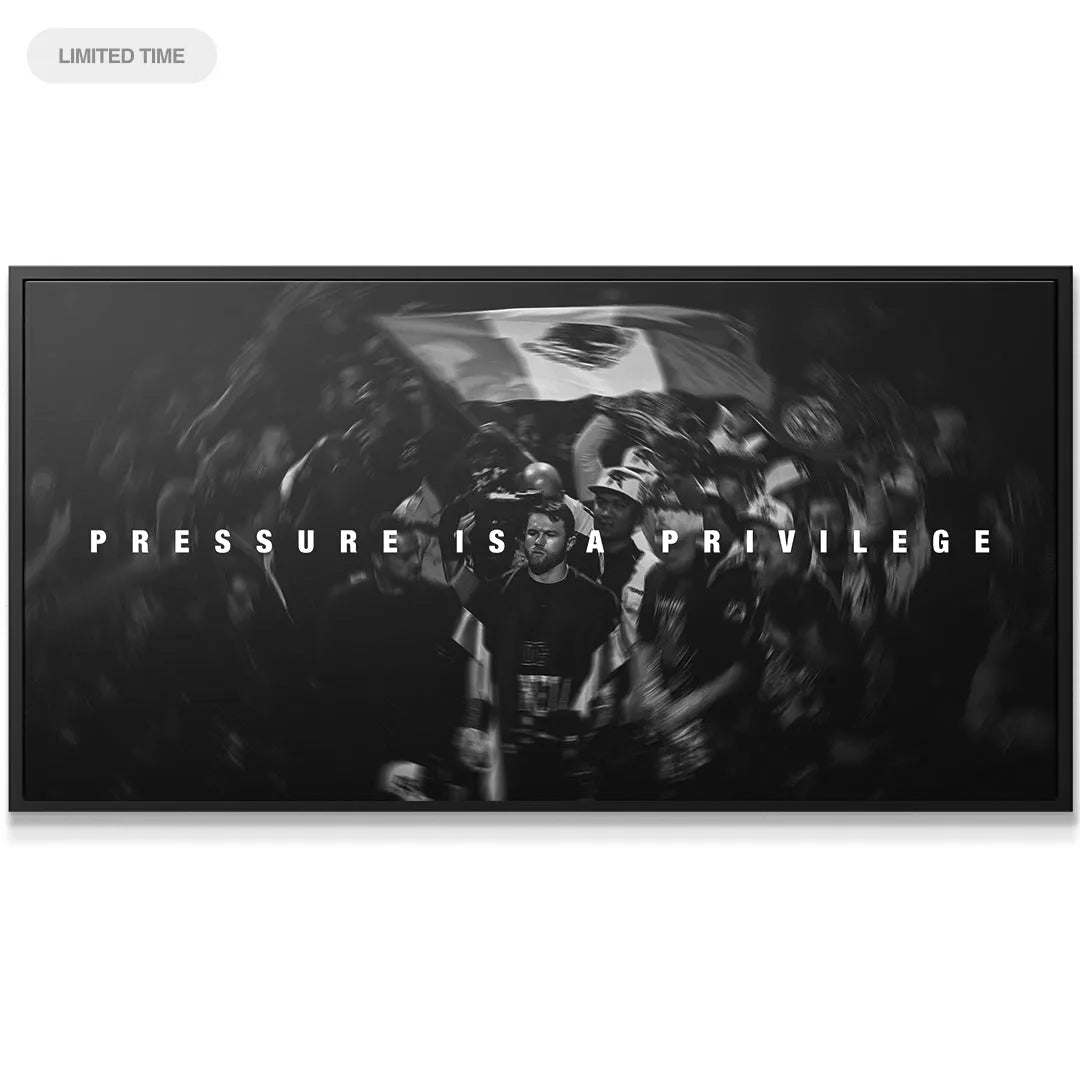 Close-up texture detail of the black and white motivational print 'Canelo - Pressure Is A Privilege'.