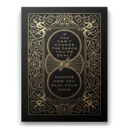 Full front view of the motivational print 'Cards You’re Dealt' featuring black matte and shining gold foil stamping.