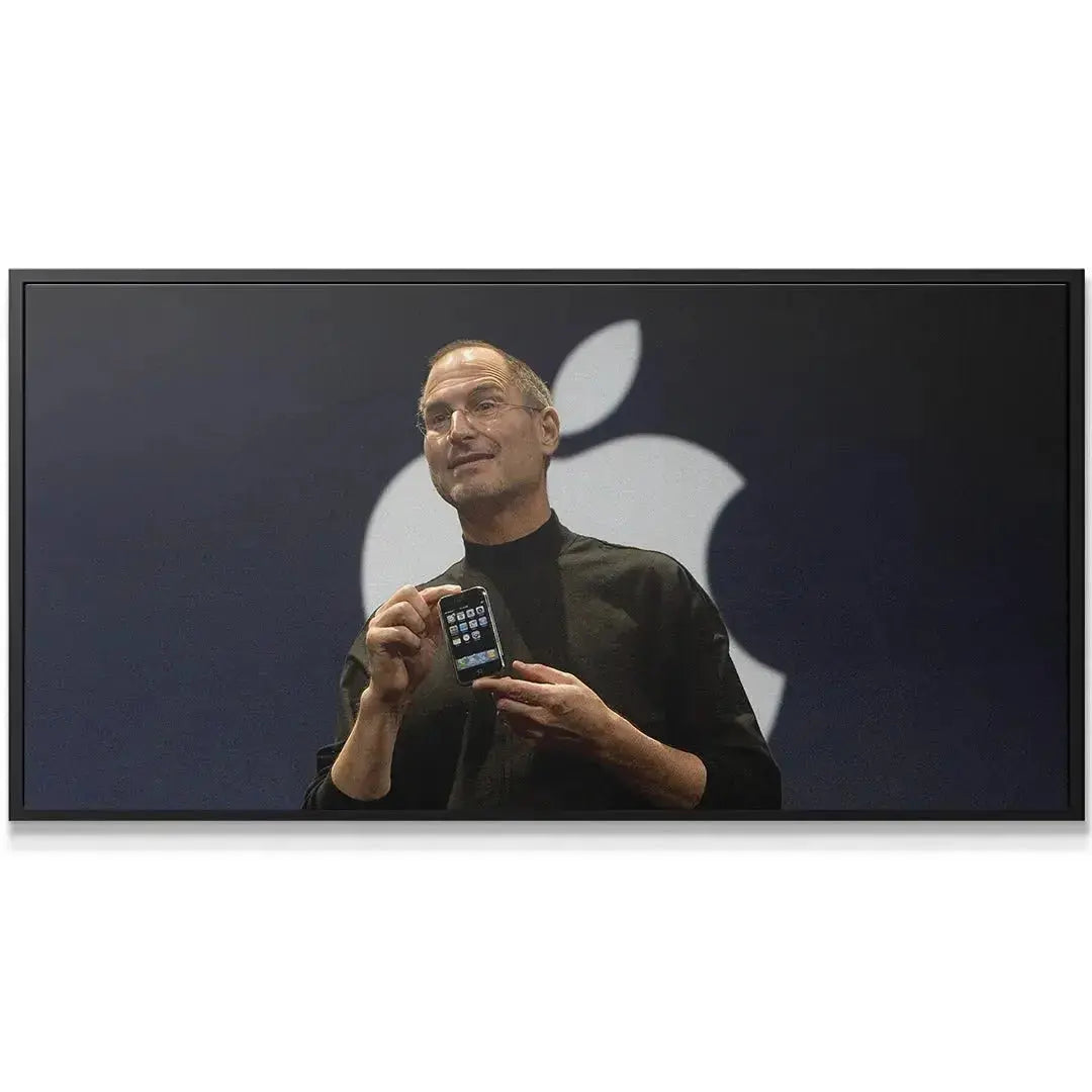 Headshot of Steve Jobs mid-speech, gesturing with the iPhone, embodying the spirit of 'Change the World.'
