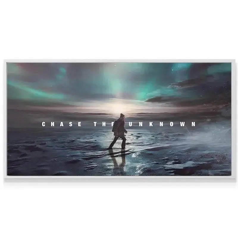 Wide-angle lifestyle mockup of the 'Chase The Unknown' print hanging above a modern, neutral-toned sofa.