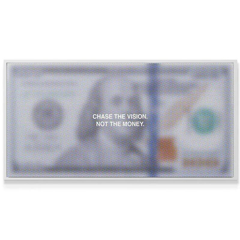 Detail shot showing the blurred hundred-dollar bill background texture beneath the 'Chase The Vision' text.