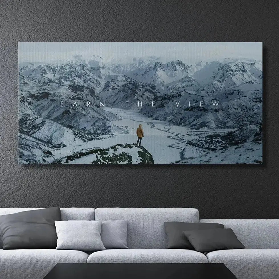 High-angle perspective showing the winding frozen river valley beneath the mountains in Chris Henry - Earn The View.