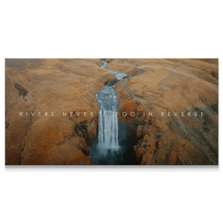 Aerial view of waterfall cutting through brown landscape with overlaid text, representing 'Chris Henry - Never Go In Reverse'.