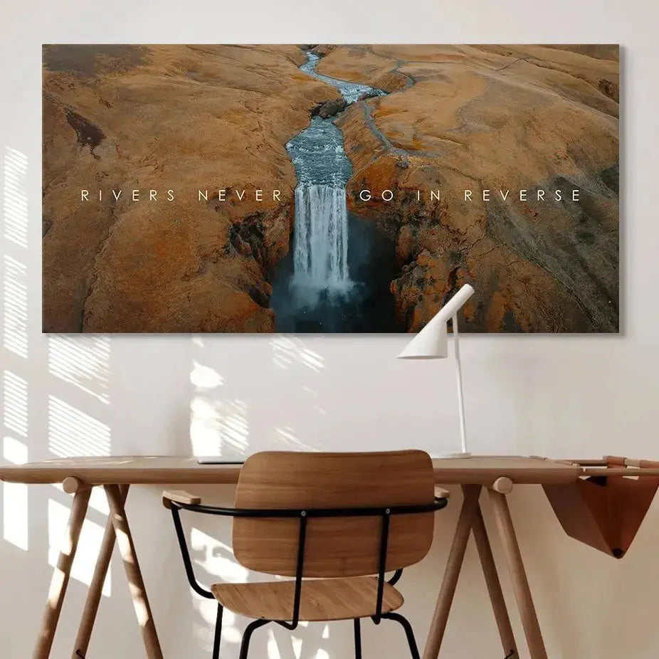 Texture detail of the arid, rust-colored terrain surrounding the river in the 'Chris Henry - Never Go In Reverse' print.
