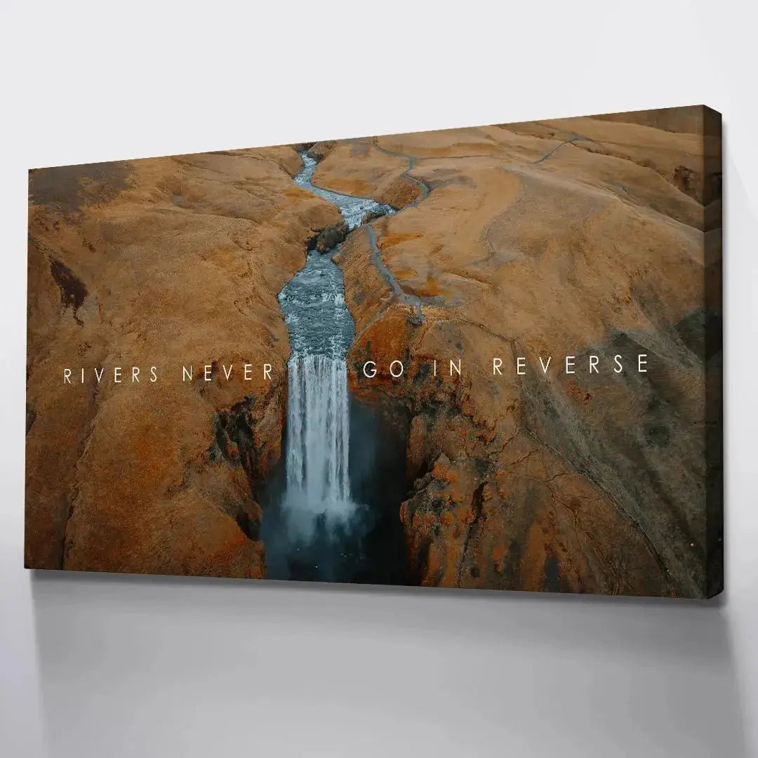 Lifestyle image showing the large-scale print 'Chris Henry - Never Go In Reverse' mounted above a minimalist sofa.
