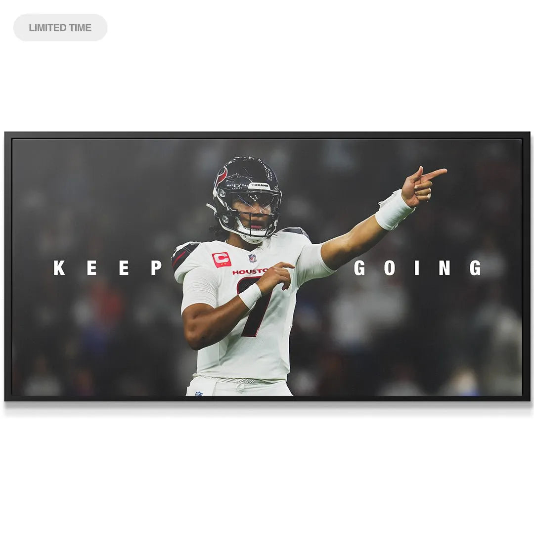 Panoramic shot of the field action highlighting the phrase "CJ Stroud - Keep Going" in white block letters.