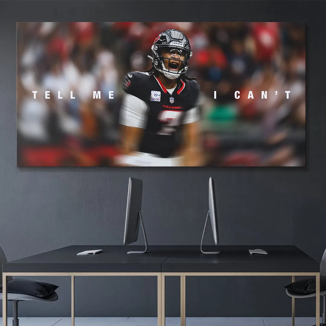 Lifestyle mock-up showing the panoramic orientation of the 'CJ Stroud - Tell Me I Can't' football poster hung in a living room.