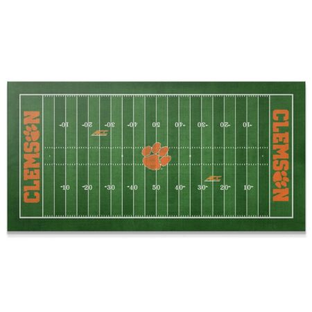Overhead view of the vibrant green Clemson - Full Field football rug, perfect for a fan cave.