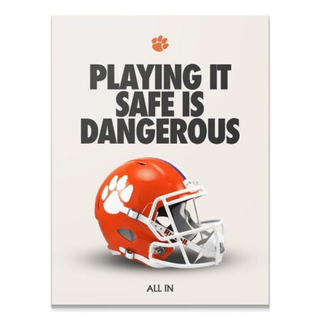 Angled view of the orange helmet poster 'Clemson - Playing It Safe' against a neutral background.