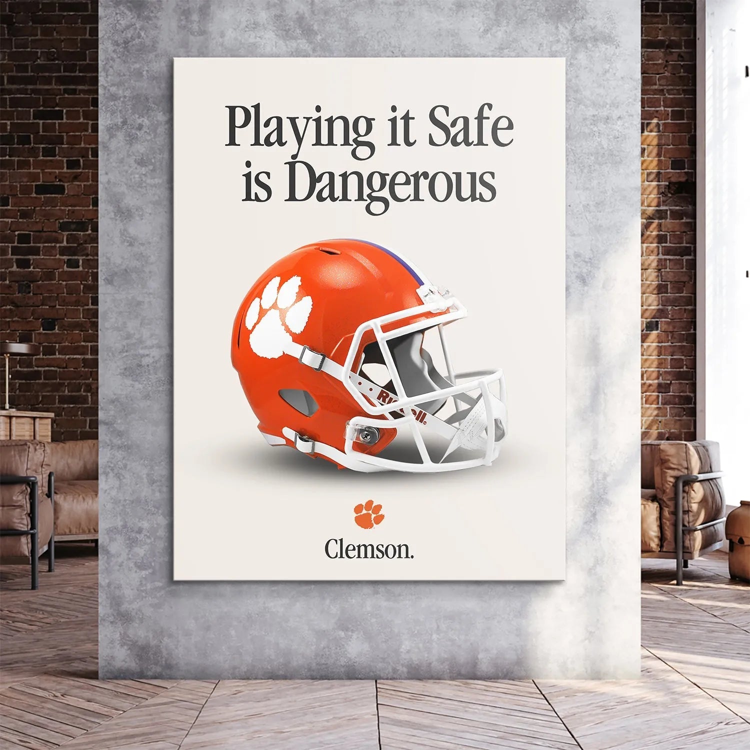 Lifestyle mock-up displaying the framed Clemson - Playing It Safe V2 poster mounted on a wall in a contemporary living space.