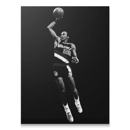 Full-body shot of Clyde Drexler - #3 mid-air during a layup attempt, high contrast