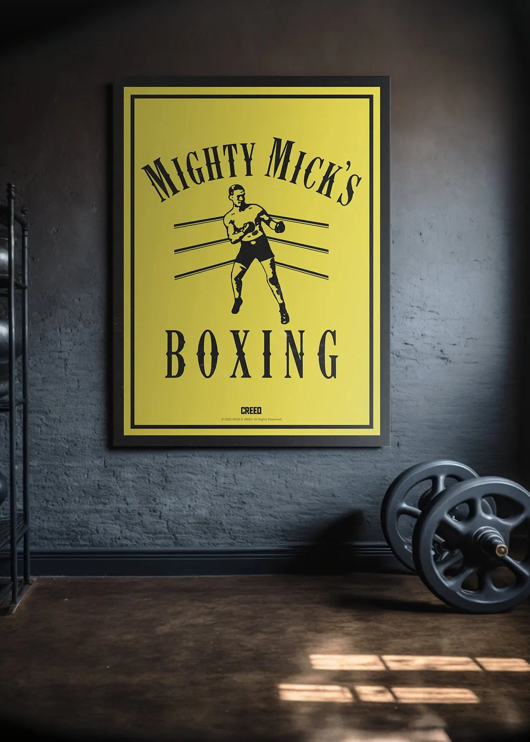 Top left corner angle showing the 'Mighty Mick's' script typography of the Creed - Mighty Micks Boxing sign.