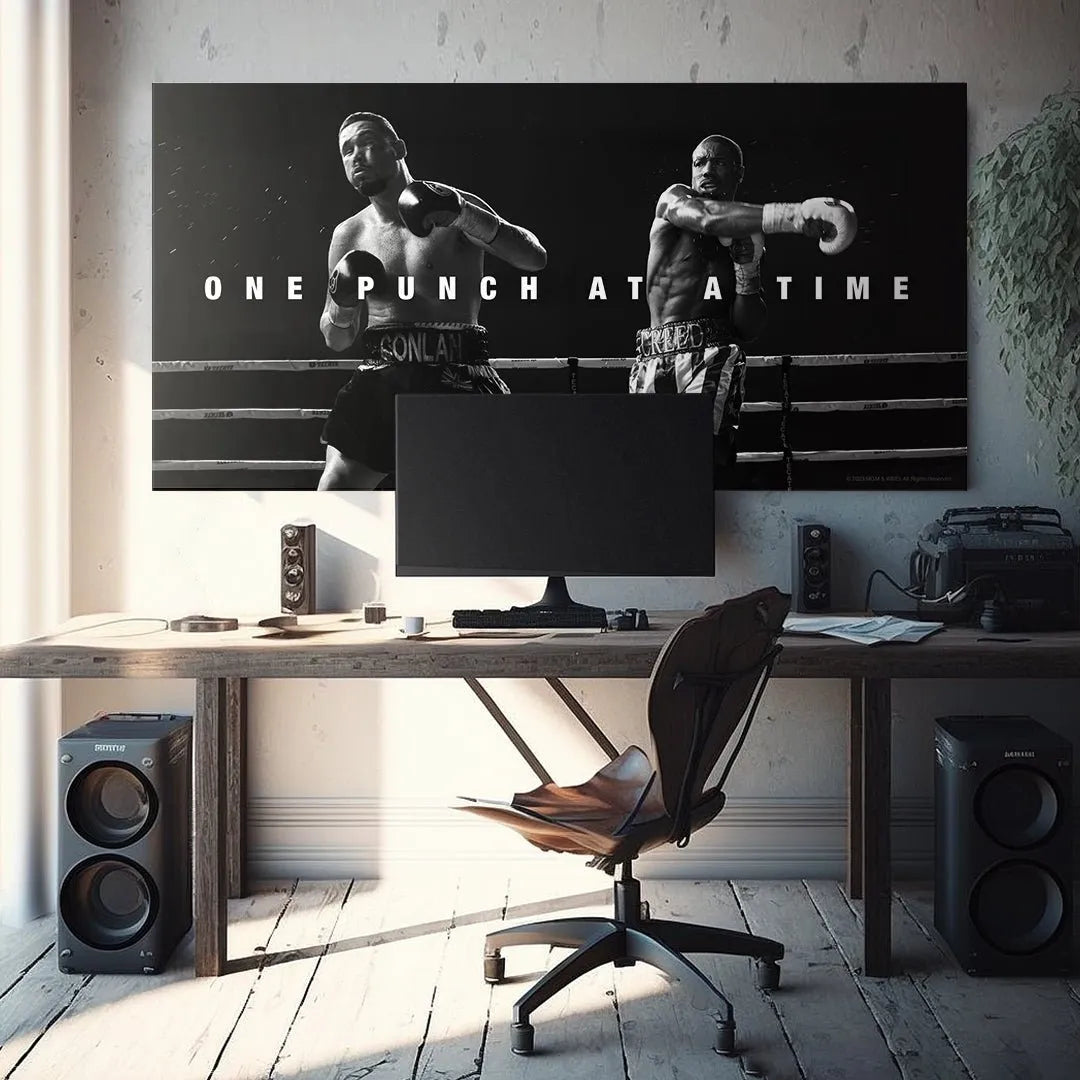 Close-up on Adonis Creed delivering a powerful straight punch or jab during the bout: Creed - One Punch At A Time.