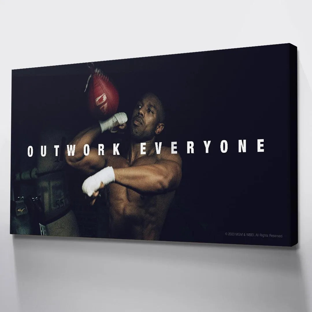 Moody, cinematic lighting of the official 'Creed - Outwork Everyone' licensed movie poster.