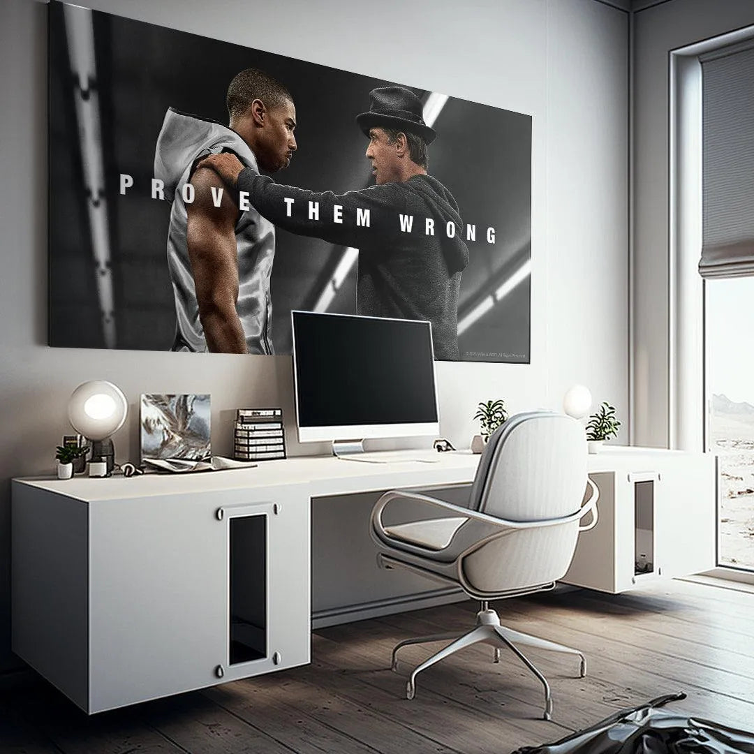 Lifestyle mockup of the framed inspirational quote "Creed - Prove Them Wrong" in a modern gym setting.