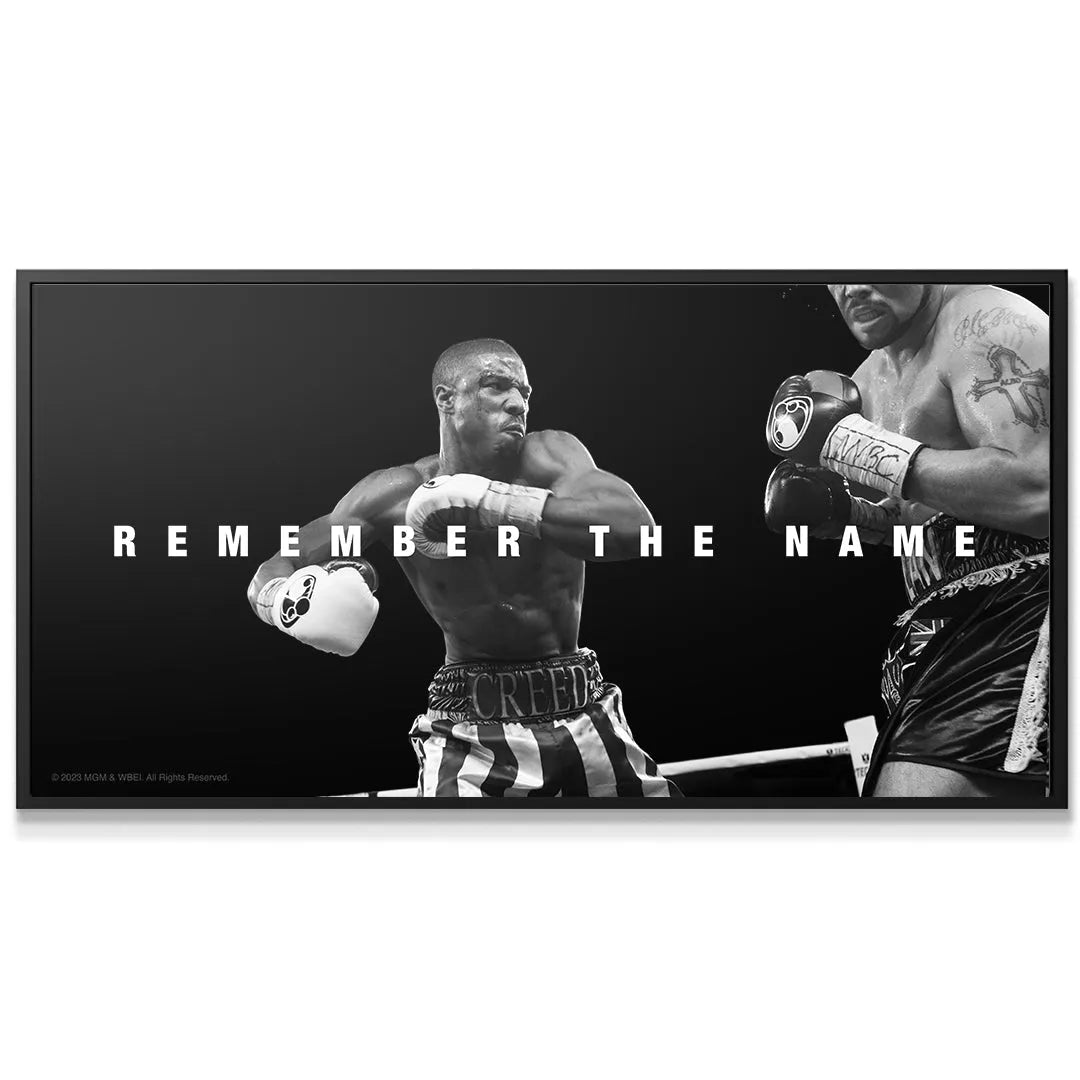 Black and white cinematic poster showing Adonis ready to strike, labeled Creed - Remember The Name.