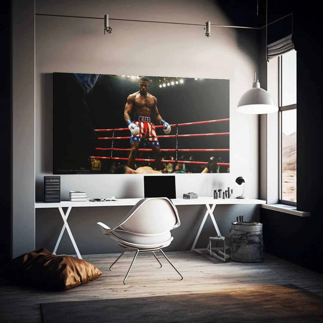 Dramatic lifestyle view showing the intense stadium lighting and mood of the boxing ring scene in 'Creed - Who's Next?'.