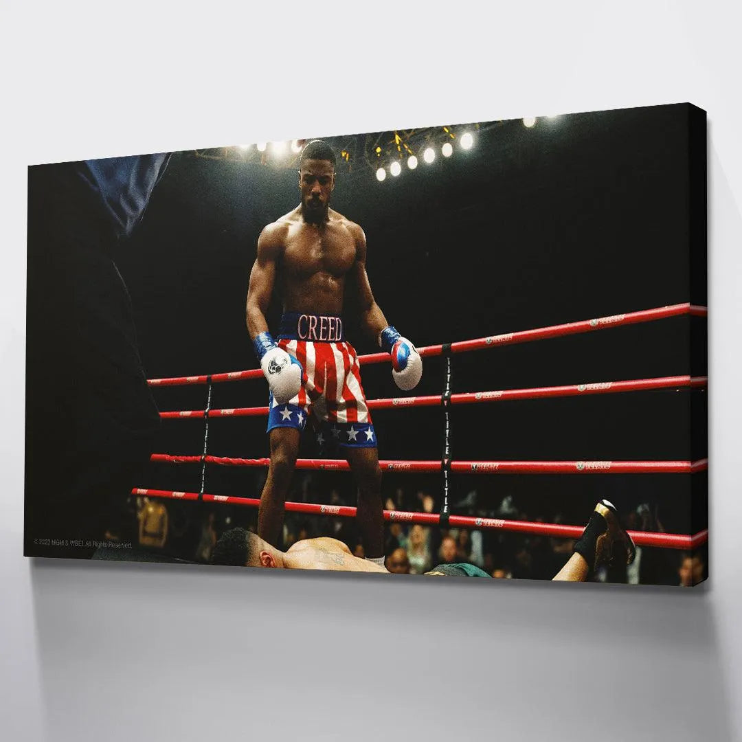 Low-angle perspective emphasizing the power and stature of the undefeated champion in 'Creed - Who's Next?'.
