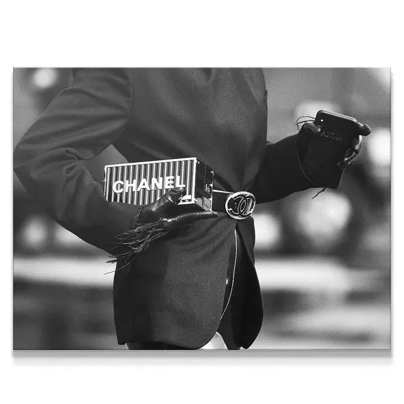 Close-up detail of the iconic designer belt buckle in the 'Cross Walk' fashion photograph.