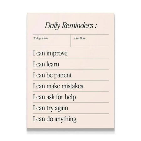Close-up shot of the elegant serif font and title on the Daily Reminders notepad.