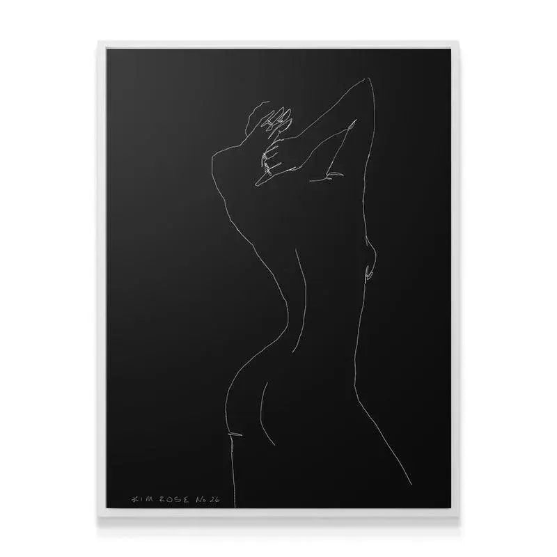 A modern lifestyle shot displaying Daisy No 26 - Black framed above a clean console table.