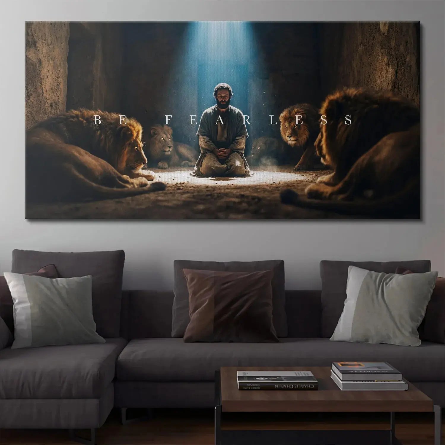 Lifestyle mock-up showing the large canvas size of Daniel In The Lions’ Den – Be Fearless hanging in a modern living room.
