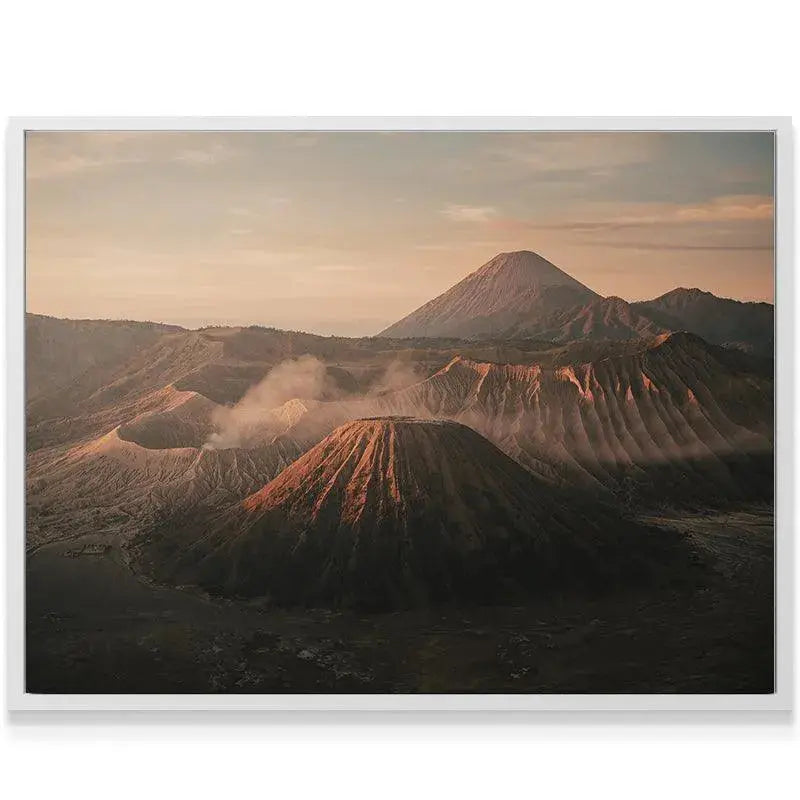 Panoramic landscape showing Mount Semeru towering over the foreground cones during Dawn of Bromo.