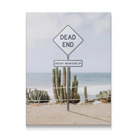 Motivational Dead End sign canvas print displayed against a coastal backdrop.