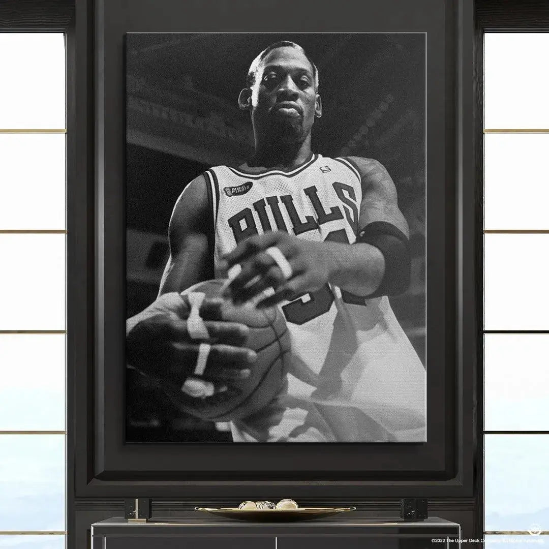 Detailed shot focusing on the taped hands and basketball grip of Dennis Rodman - Bullish.