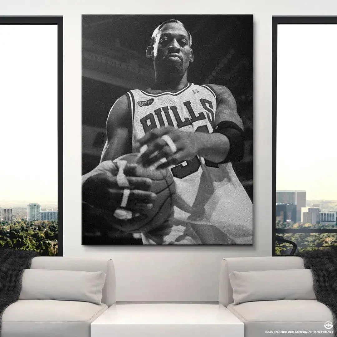 Black and white portrait emphasizing the intense gaze and concentration of Dennis Rodman - Bullish.