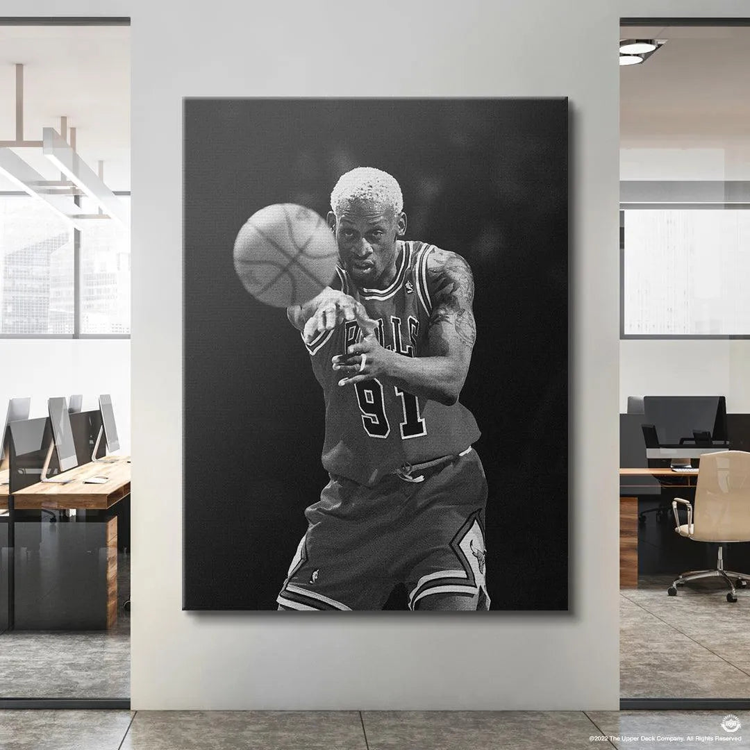 Angled lifestyle view of the framed Dennis Rodman - Perspective canvas in a modern living space setting.