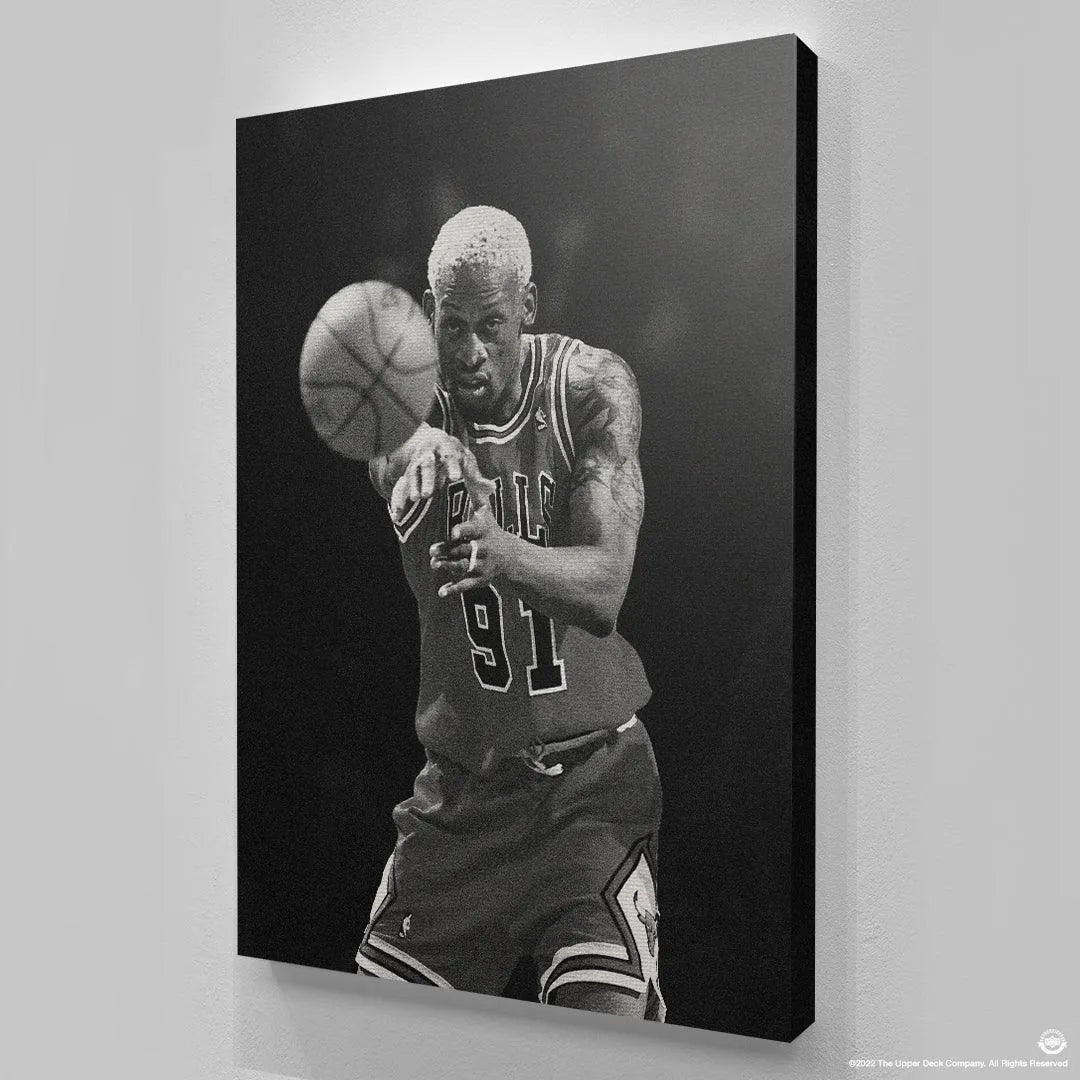 Upper body crop showing Rodman's bleached hair and distinctive arm tattoos featured in Dennis Rodman - Perspective.