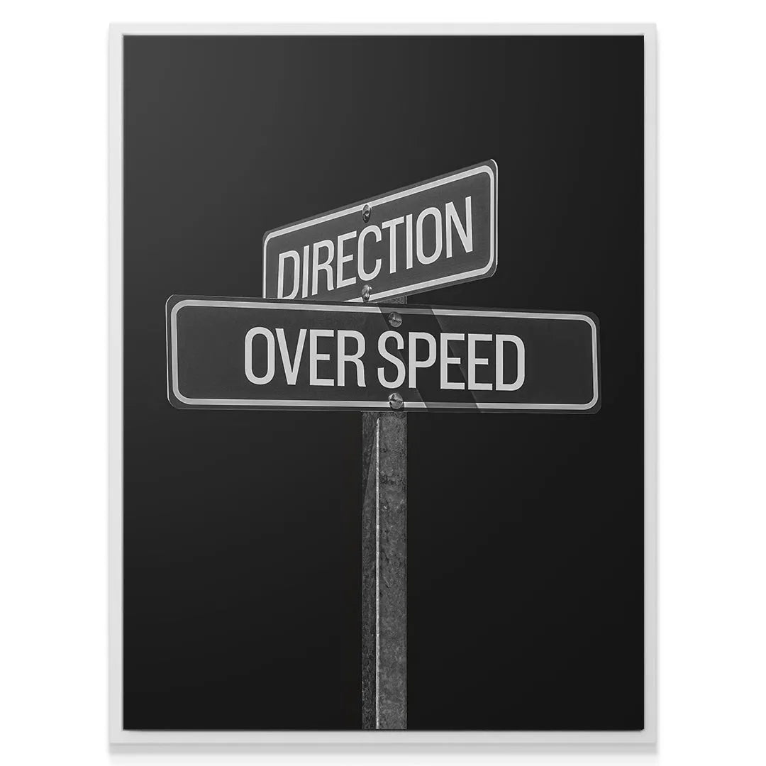 Angled perspective showing the reflective surface finish of the Direction Over Speed Sign canvas print.